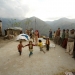 children dancing in remote village