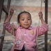 girl on makeshift swing