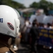 watchful eye - police at sri lanka rally